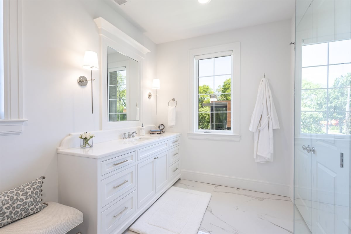bathroom-with-a-white-vanity-marble-floor-and-glass-shower-southeast-mi-optimized