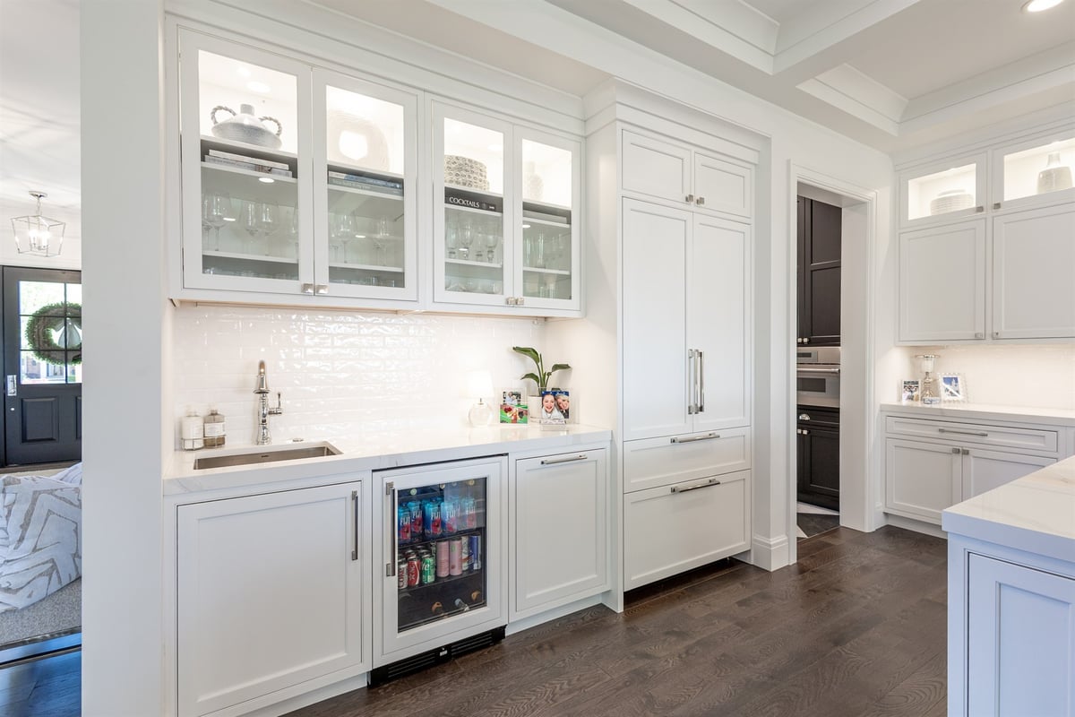 butler-s-pantry-with-white-glass-front-cabinets-and-a-beverage-fridge-southeast-mi-optimized