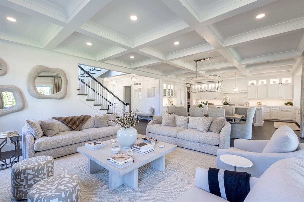 family-room-open-to-the-kitchen-with-a-coffered-ceiling-and-staircase-southeast-mi-optimized