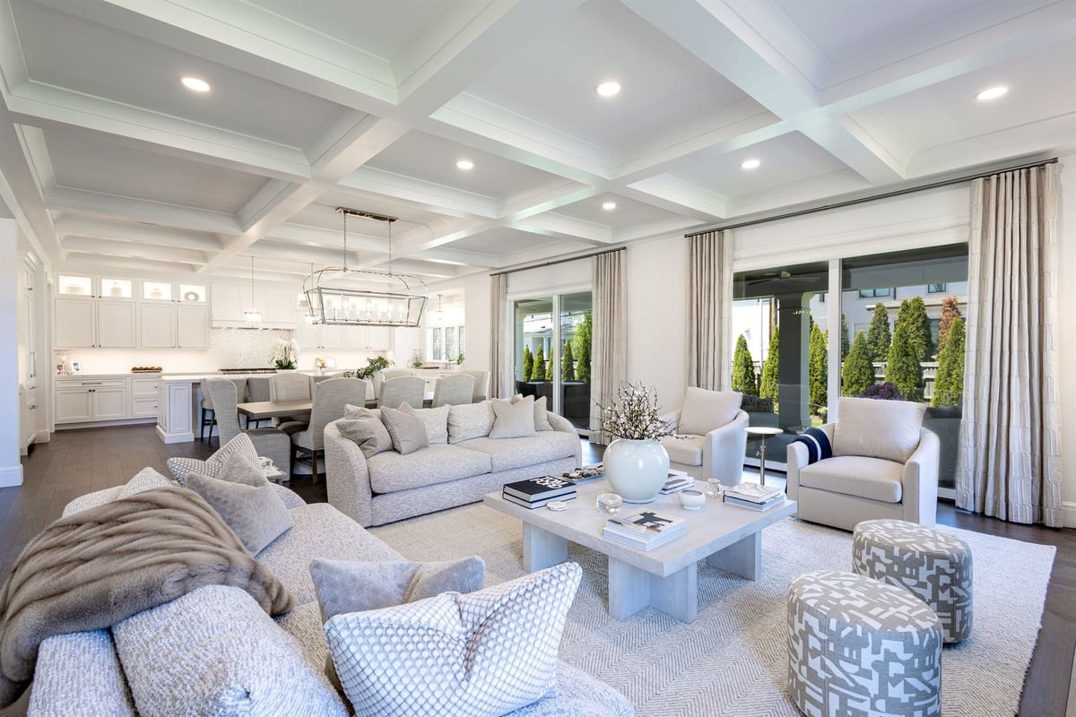 great-room-open-to-the-kitchen-with-a-coffered-ceiling-and-sliding-doors-southeast-mi-optimized