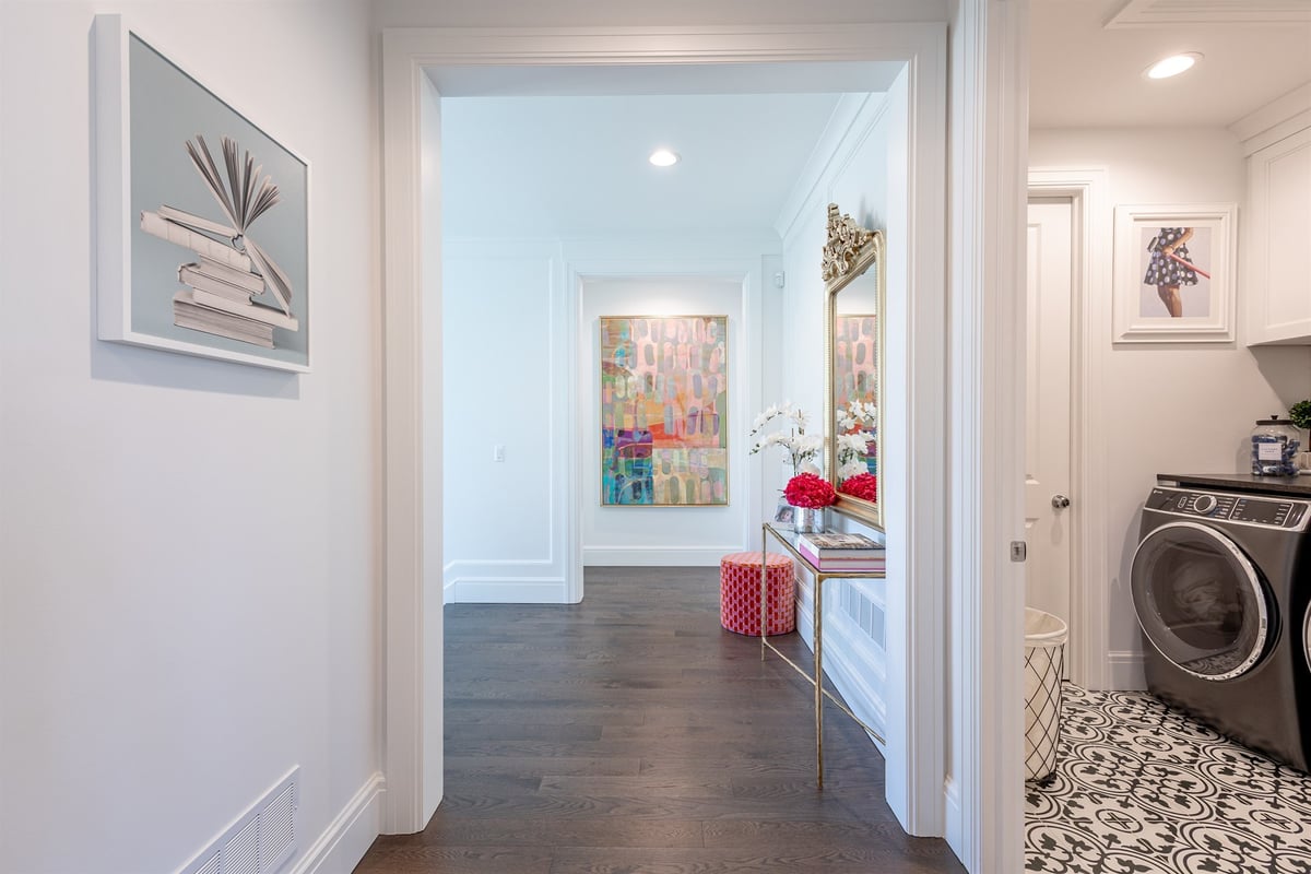 hallway-with-hardwood-floors-and-a-view-to-the-laundry-room-southeast-mi-optimized