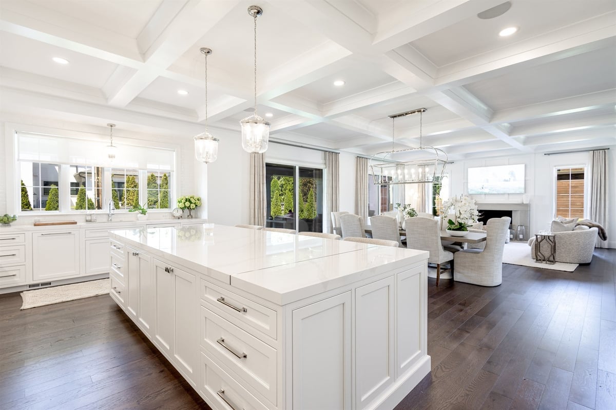 kitchen-island-open-to-the-dining-and-living-areas-with-a-coffered-ceiling-southeast-mi-optimized