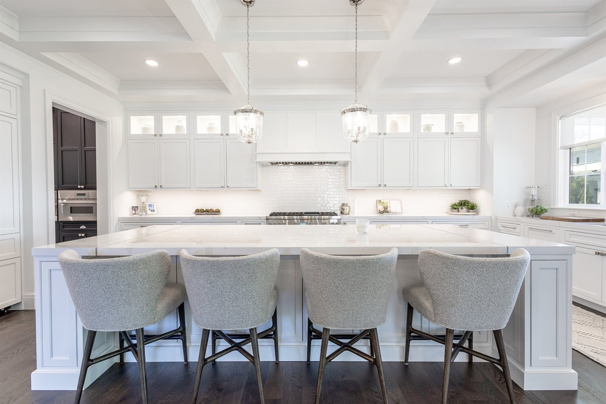 main-kitchen-with-a-large-white-island-pro-range-and-pendant-lights-southeast-mi-optimized