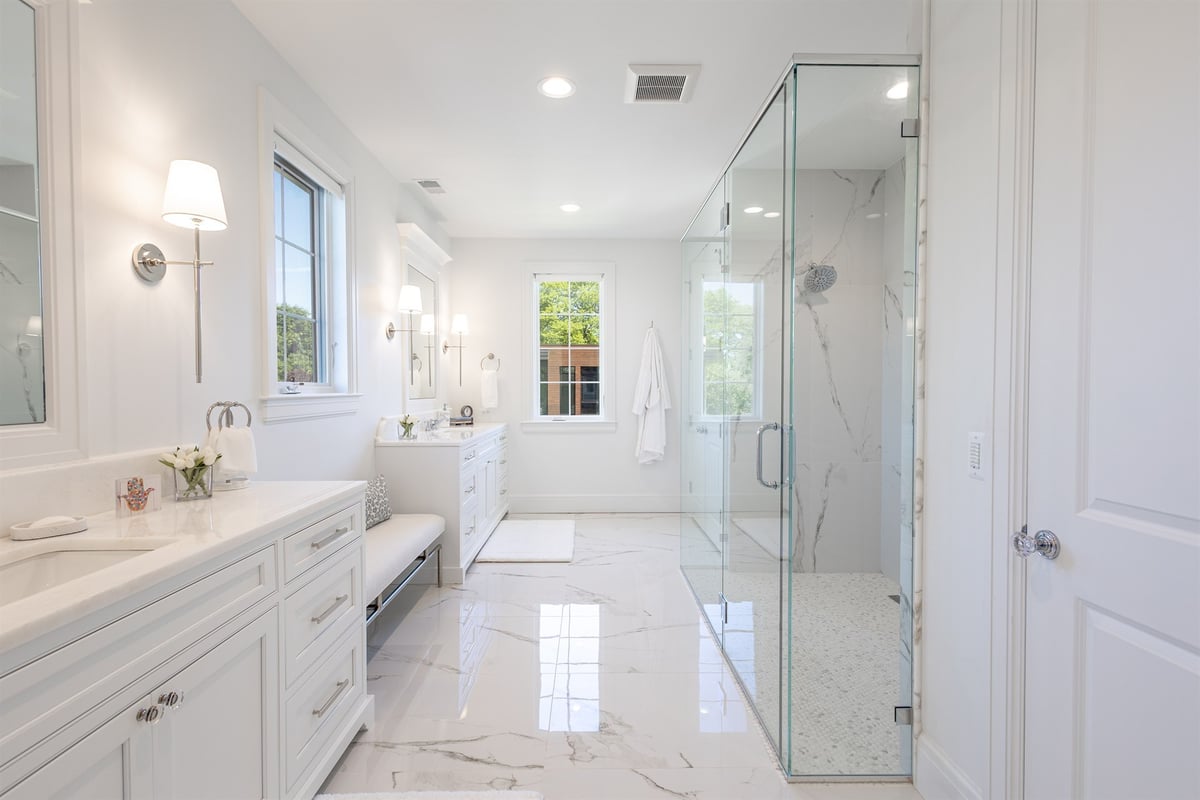 master-bath-with-a-white-double-vanity-marble-floor-and-glass-shower-southeast-mi-optimized