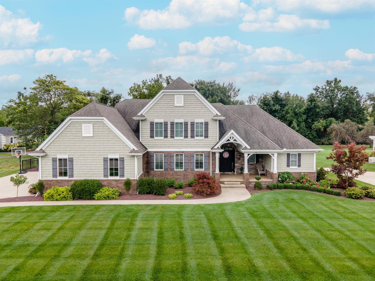 front-angle-of-a-shingle-and-brick-two-story-custom-home-southeast-mi-optimized