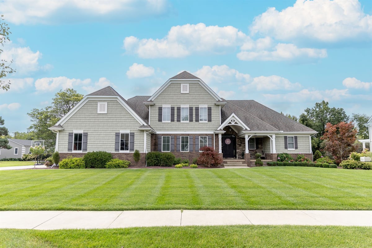 front-elevation-of-a-large-custom-home-with-a-shingle-and-stone-facade-southeast-mi-optimized