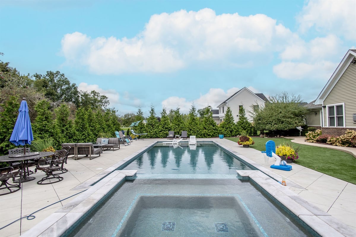 in-ground-pool-and-raised-spa-with-a-patio-and-landscaping-southeast-mi-optimized