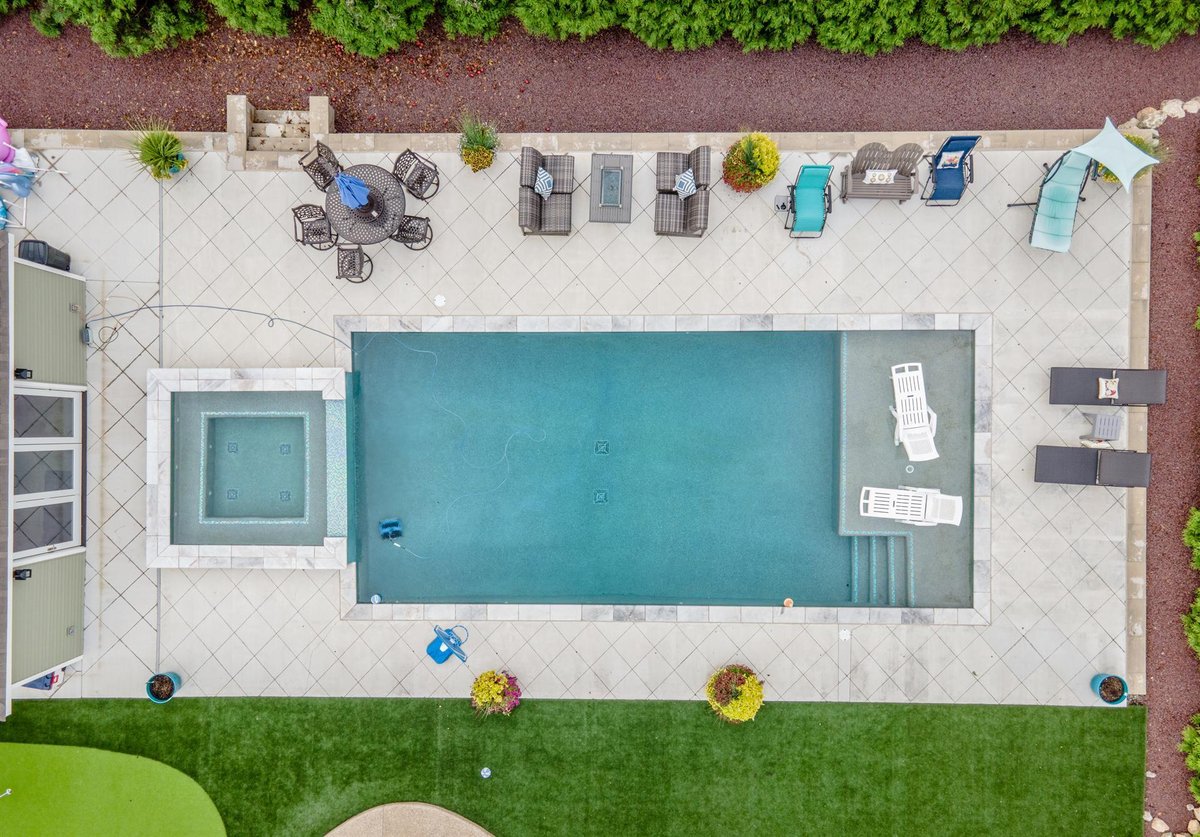 overhead-of-the-pool-spa-and-patio-with-lounge-seating-southeast-mi-optimized