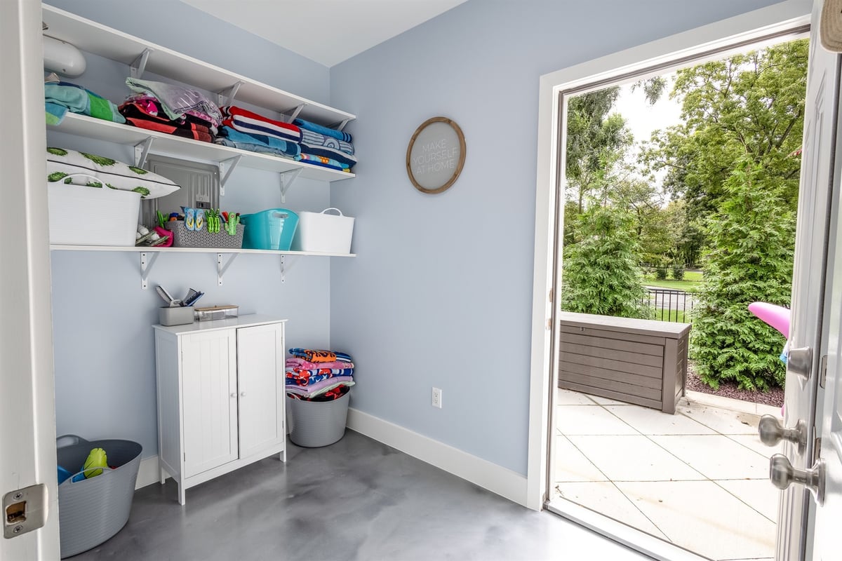 pool-house-changing-area-with-open-shelving-and-a-cabinet-southeast-mi-optimized