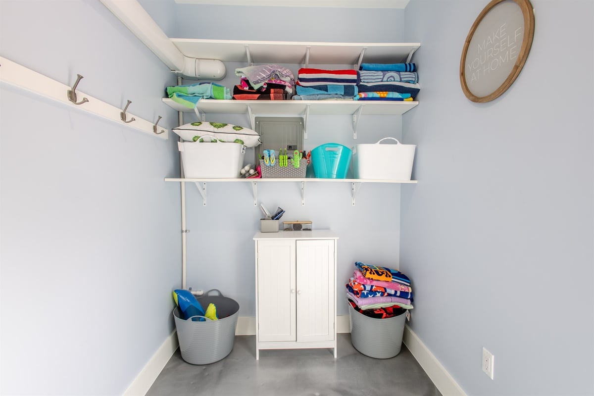 pool-house-storage-with-towel-shelving-and-hooks-southeast-mi-optimized