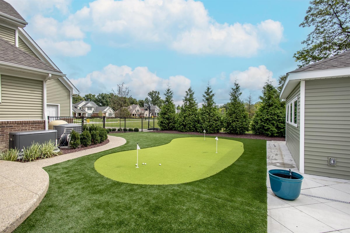 putting-green-beside-the-pool-house-and-home-southeast-mi-optimized