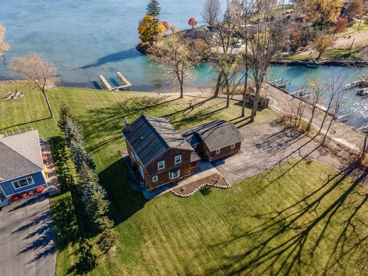 aerial-of-the-brown-wood-home-and-garage-before-renovation-grosse-ile-mi-optimized