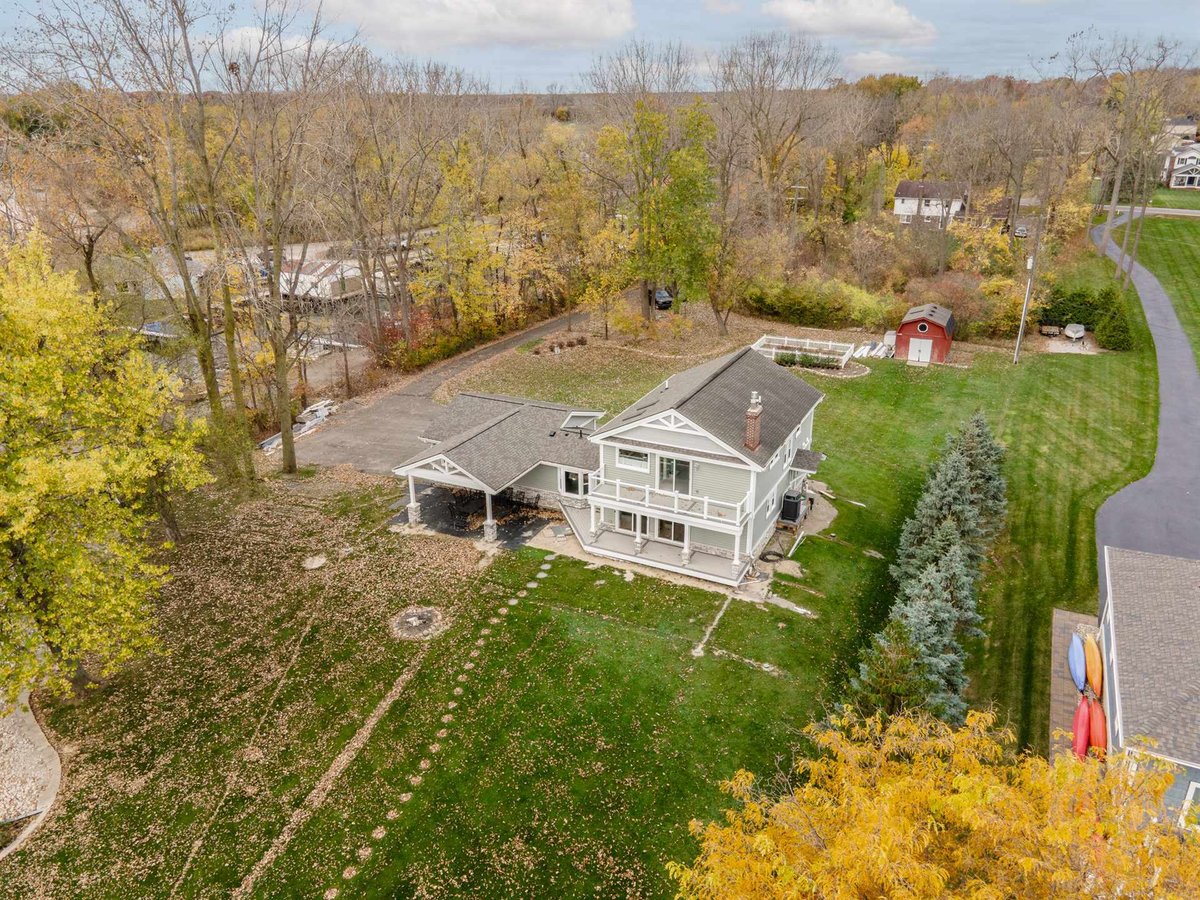 aerial-of-the-renovated-home-garage-and-backyard-grosse-ile-mi-optimized