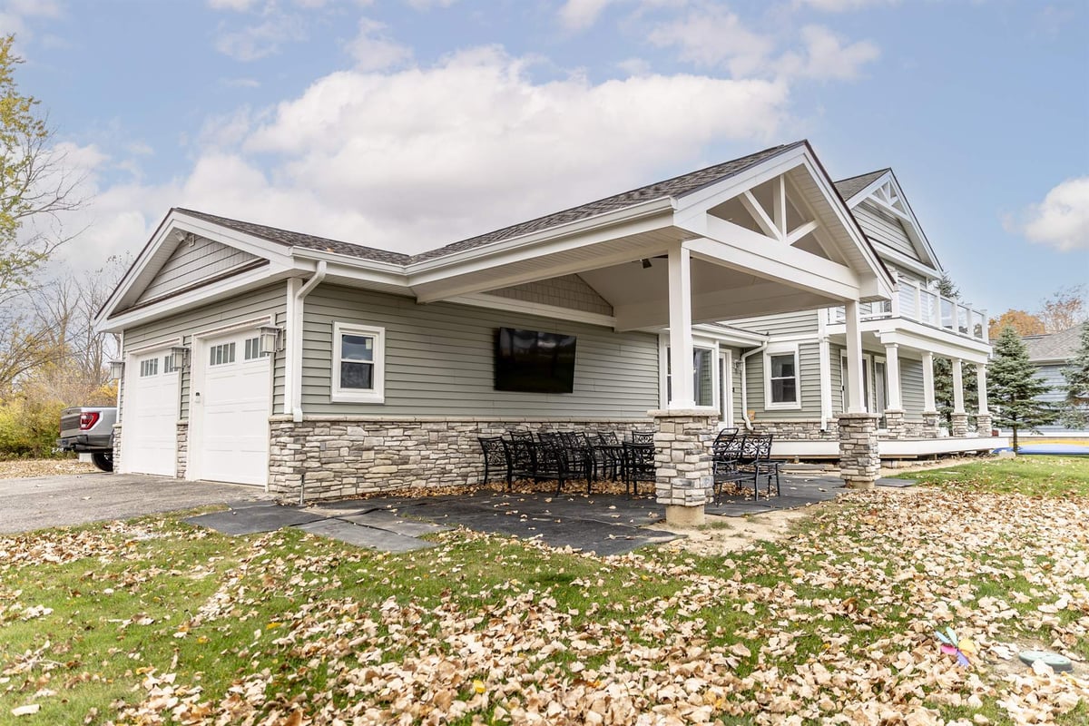 side-angle-of-the-renovated-home-garage-and-covered-porch-grosse-ile-mi-optimized