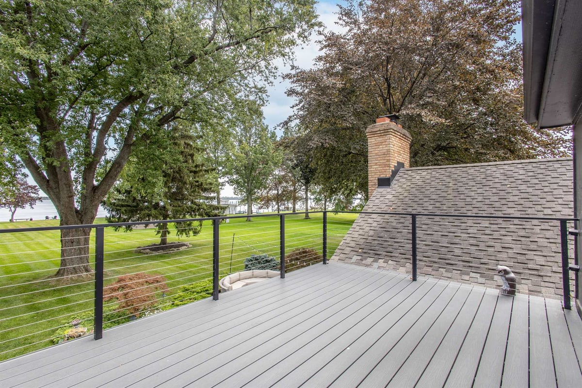 composite-deck-with-a-cable-railing-and-mature-trees-beyond-southeast-mi-optimized