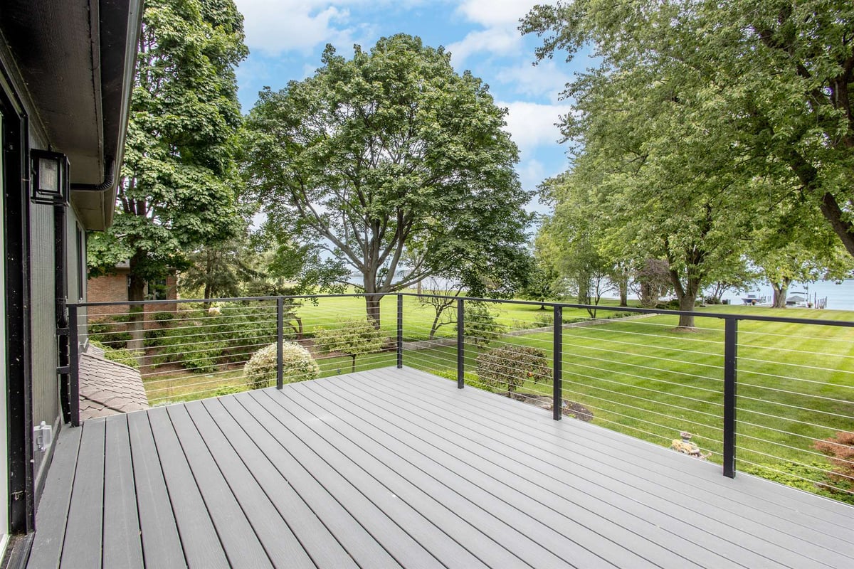 composite-deck-with-a-cable-railing-and-views-toward-the-water-southeast-mi-optimized
