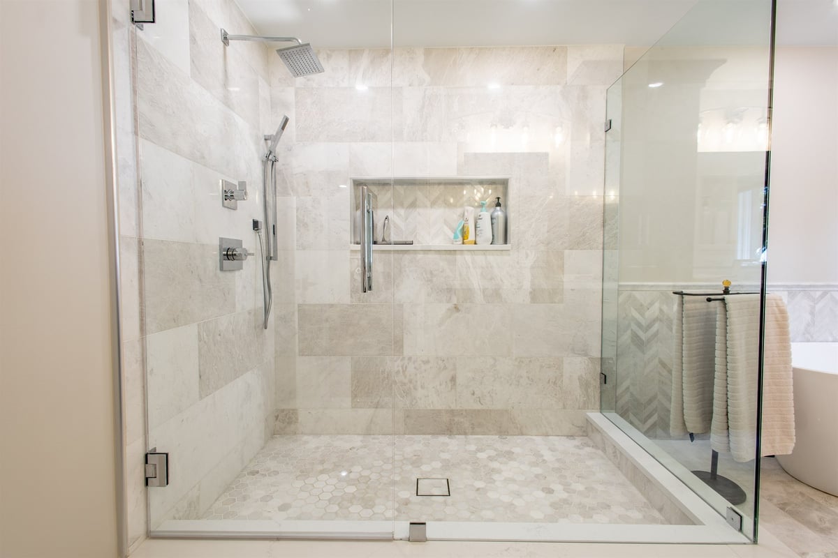 master-bath-marble-walk-in-shower-with-a-rain-head-and-chevron-accent-southeast-mi-optimized
