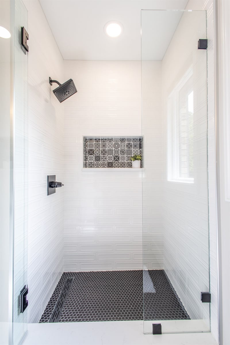 walk-in-shower-with-white-subway-tile-and-a-patterned-tile-niche-southeast-mi-optimized