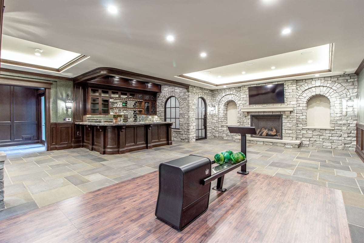 basement-bar-and-rec-room-with-a-stone-fireplace-and-slate-floors-southeast-mi-optimized