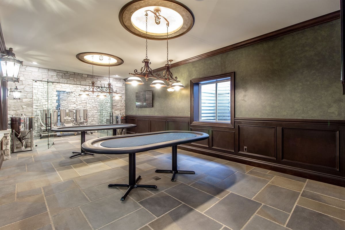 poker-room-with-green-walls-wainscoting-and-chandeliers-southeast-mi-optimized