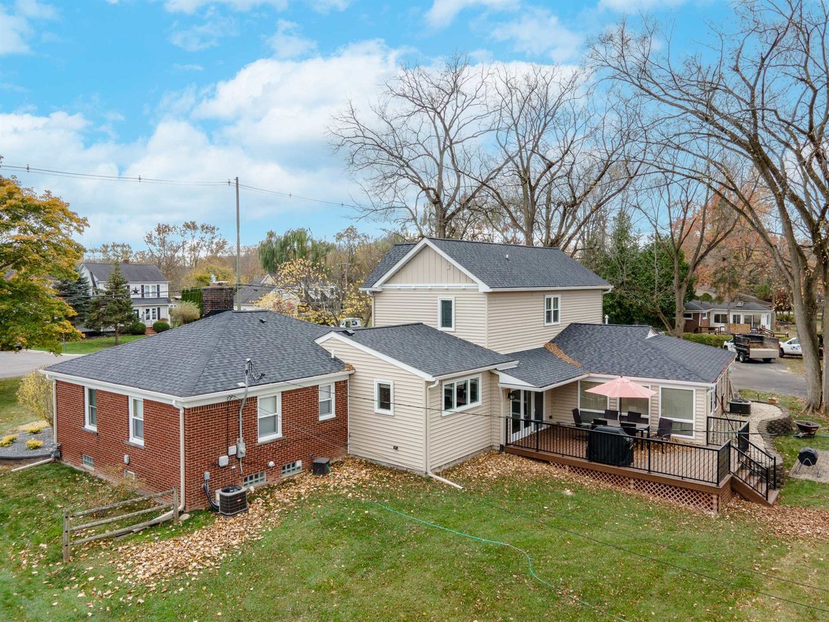 aerial-rear-after-renovation-with-the-addition-deck-and-backyard-grosse-ile-mi-optimized