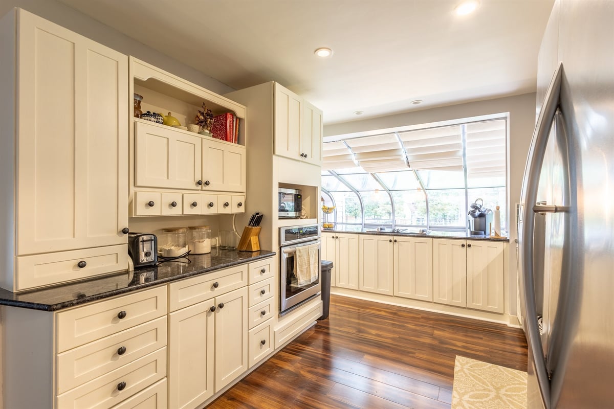 kitchen-renovation-with-cream-cabinets-and-a-wall-oven-grosse-ile-mi-optimized