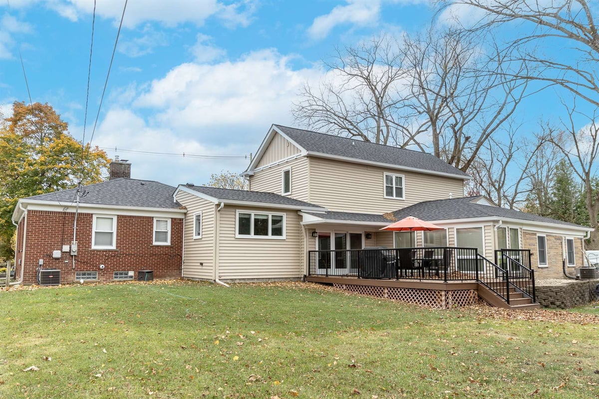 rear-exterior-after-renovation-with-a-new-two-story-addition-and-deck-grosse-ile-mi-optimized