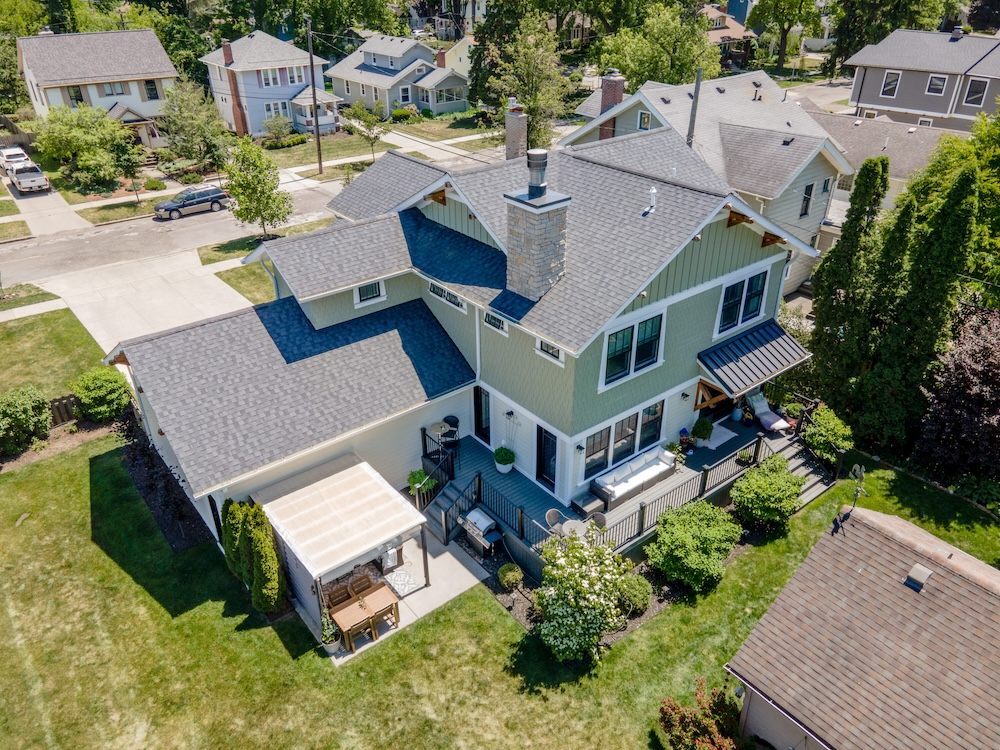 aerial-rear-renovated-home-covered-deck-and-backyard-royal-oak-mi-optimized.jpg