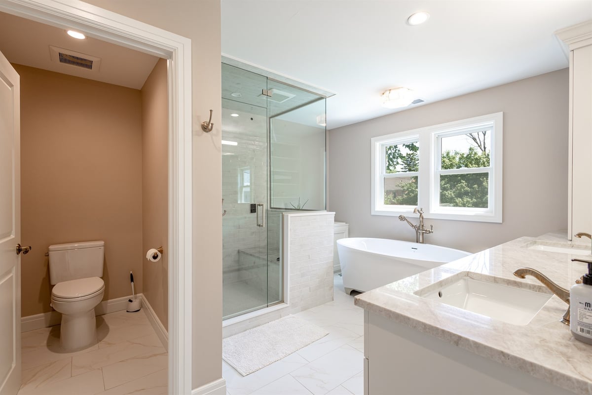 master-bath-with-a-freestanding-tub-glass-shower-and-marble-vanity-southeast-mi-optimized