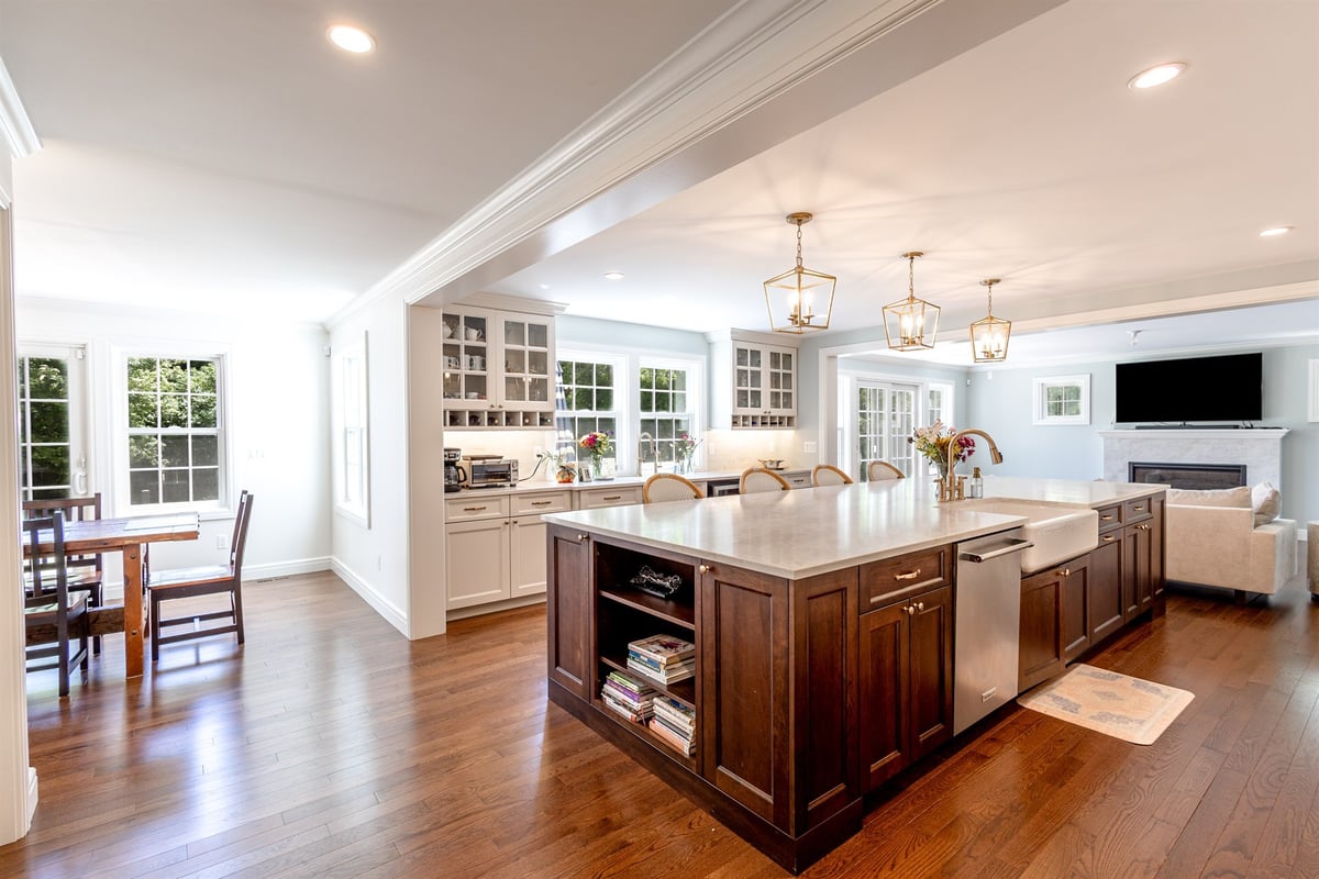 open-kitchen-with-a-large-island-farmhouse-sink-and-dark-wood-cabinetry-southeast-mi-optimized
