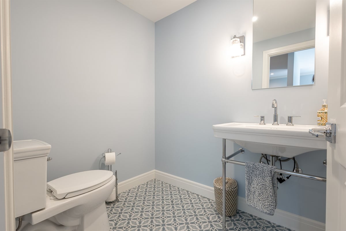 renovated-powder-room-with-a-console-sink-and-patterned-floor-tile-southeast-mi-optimized