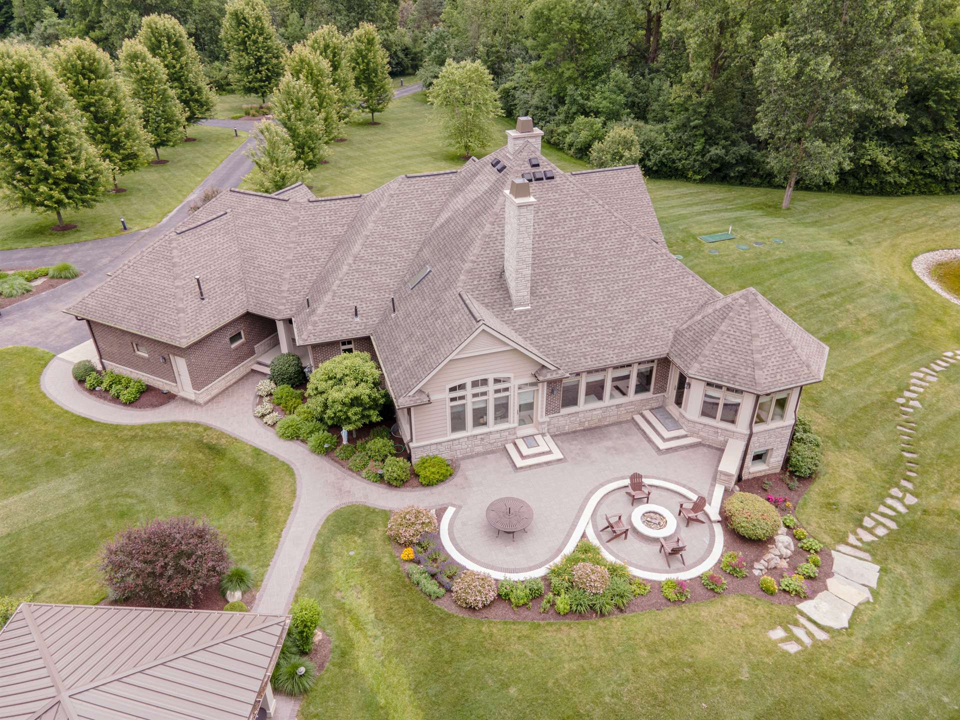 bird-s-eye-view-rear-of-house-exterior-view-southeast-mi-optimized