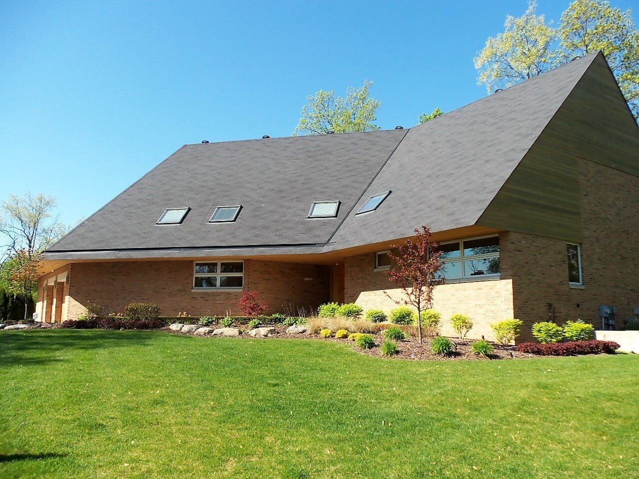 renovated-contemporary-brick-home-sloped-roof-and-skylights-farmington-hills-mi-optimized