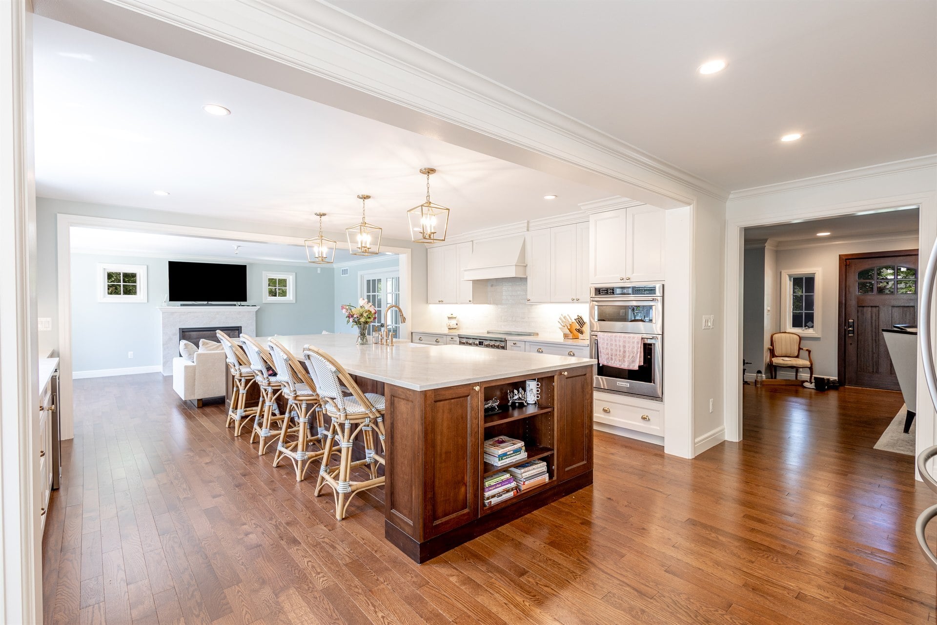 open-kitchen-with-a-large-island-pendant-lights-and-adjoining-living-area-southeast-mi-optimized